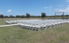 White Poly Folding Chair Rentals in the Victoria Texas area.