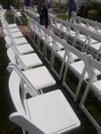 White Foldable Resin Chairs Rentals in the Victoria Texas area.